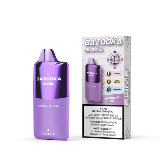 A purple Bazooka Slims disposable vaping device stands next to its retail packaging box on a clean white background. The packaging features white, purple, and black colors with product details and warning labels.