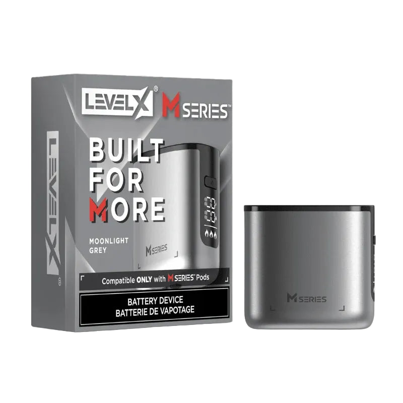 Level X M Series battery device in Moonlight Grey shown next to its retail packaging box on a white background.
